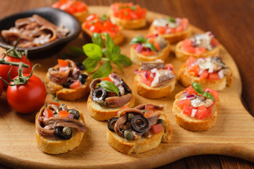 Mix Bruschetta with sardines and anchovies.