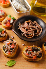 Mix Bruschetta with sardines and anchovies.