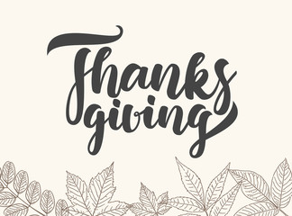Fototapeta premium Handwritten elegant lettering of Thanksgiving with hand drawn autumn leaves.