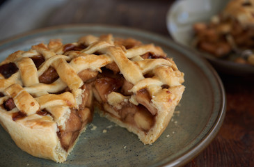 Apple pie in home mood. Spicy caramel apple pie and slice