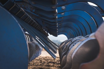 Tractor plowing the field on a sunny day