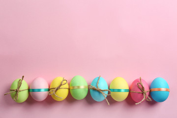 Fototapeta na wymiar Decorated Easter eggs on color background