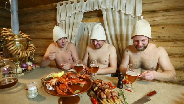 friends men relax in the traditional Russian bath