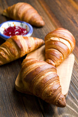 Fresh croissants on a wood