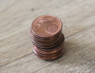 stacked five euro cent coins