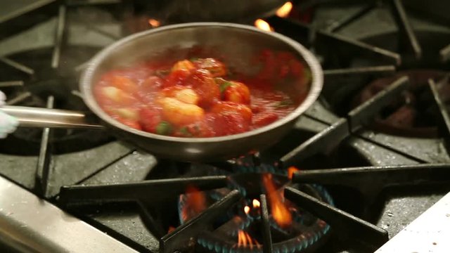 Gnocchi in tomato sauce, preparation process in te pan