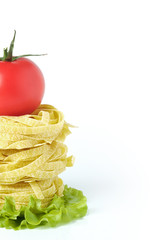 Pasta with tomatoes on a white background