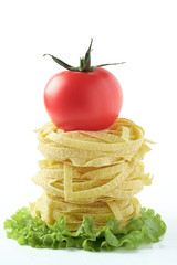 Pasta with tomatoes on a white background