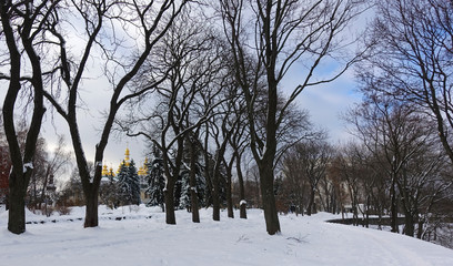 Park Vladimir's Hill in Kiev. Winter. In the distance the Mikhaylovsky Golden-domed Cathedral