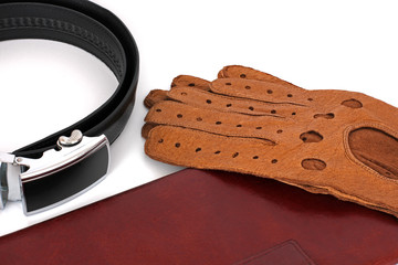 A man's set. Accessories for men. Wallet, gloves, matches, belt