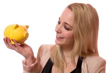Junge Frau mit Sparschwein