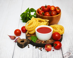 Bowl with tomato sauce