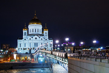Fototapeta na wymiar Russia. Moscow. The Cathedral of Christ the Savior and the Patriarchal Bridge in the evening with beautiful illumination.