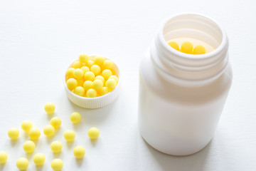 white bottle and vitamin c