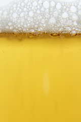 Close-up of beer and foam