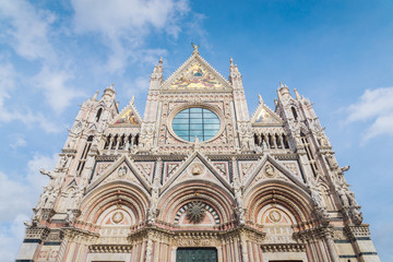 Fototapeta na wymiar Siena Cathedral is a medieval church in Siena, Italy, dedicated from its earliest days as a Roman Catholic Marian church, and now dedicated to the Assumption of Mary