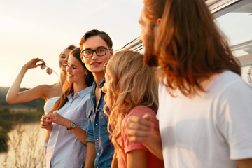 Fototapeta premium Friends Travel In Summer. People Having Fun On Trip