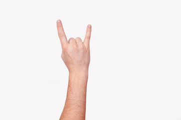 One hand making horns gesture isolated on white background. Rock and roll gesture.