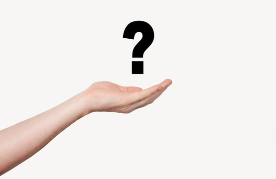 Male hand holding a Question symbol over white background