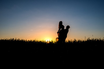 Couple dancing in the sunset