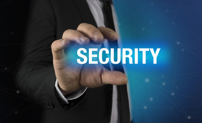 Businessman with security concept in his hands