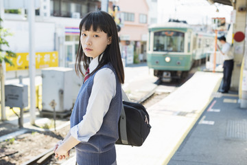 女子高生　通学　電車