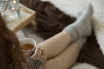 Woman drinking hot tea