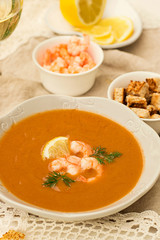French traditional fish soup bisque with lobster and shrimps