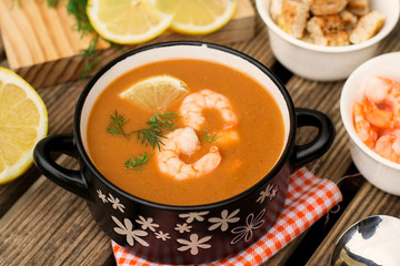 French traditional fish soup bisque with lobster and shrimps
