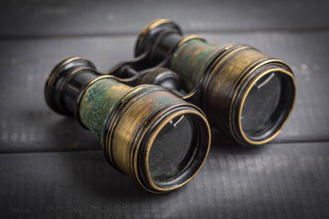Old binoculars covered with patina.