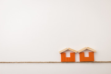 dual orange house icon on white space