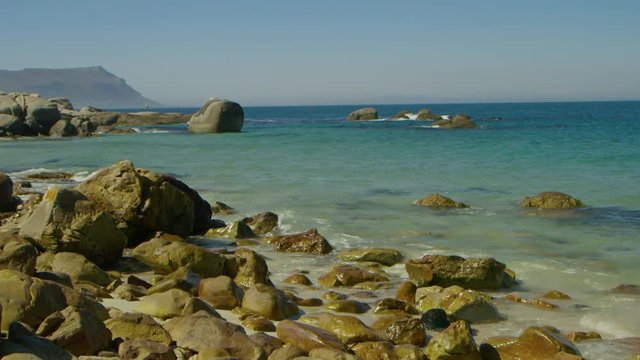 Rocky beach with translucent water - Simonstown