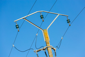 electric pole power lines and wires with blue sky