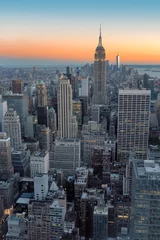 Fototapeten Skyline von New York, Manhattan bei Sonnenuntergang. © lucky-photo