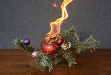 Dry Christmas decoration on fire.