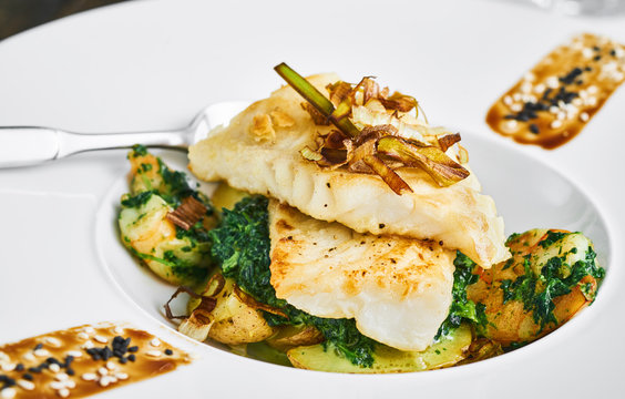 Cod with roasted potatoes and herbs