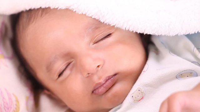 Close up of newborn baby sleeping