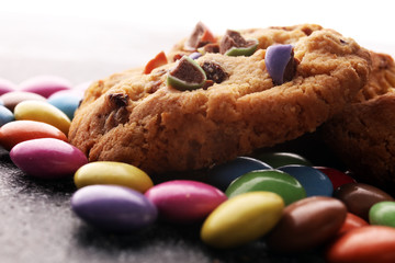 Chocolate cookies with colorful candies. Chocolate chip smarties cookies.