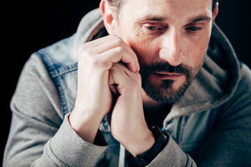 Handsome man with isolated down look. Having problems with libido.