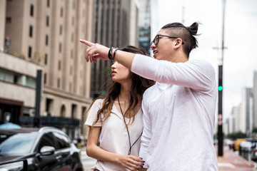 Young Asian Couple Tourist in Paulista Avenue, Sao Paulo, Brazil