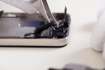 Tweezers Changing Broken Camera Of Mobile Phone