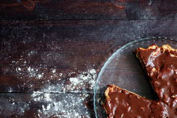 charlotte with chocolate glaze on wooden table