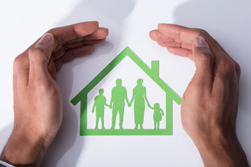 Person Protecting Family Home