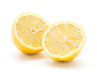 Two lemon halves isolated on white background one yellow lemon cut in half.