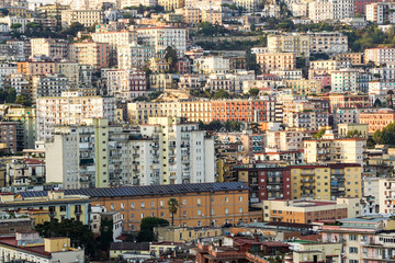 Fototapeta na wymiar Aerial view of traditional red house roofs at the Naples Town Square, Napoli Italy . urban agglomeration