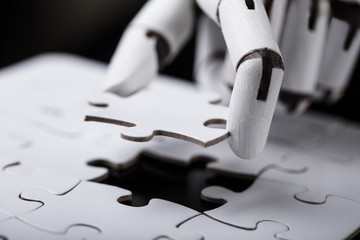 Robot Holding Jigsaw Puzzle