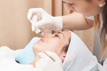 close up of a young woman having mesotherapy treatment in beauty salon
