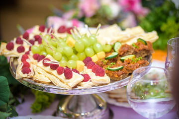 Selective focus on sliced strawberry and cream on top of cheesecake decorated with chocolate crust dessert sweet sugar fruits recipe traditional cake restaurant serving concept