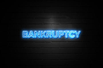 Bankruptcy neon Sign on brickwall