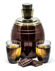 Old cognac in a glass bottle
